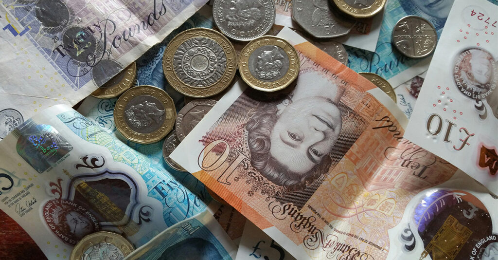 Picture of cash showing coins and notes