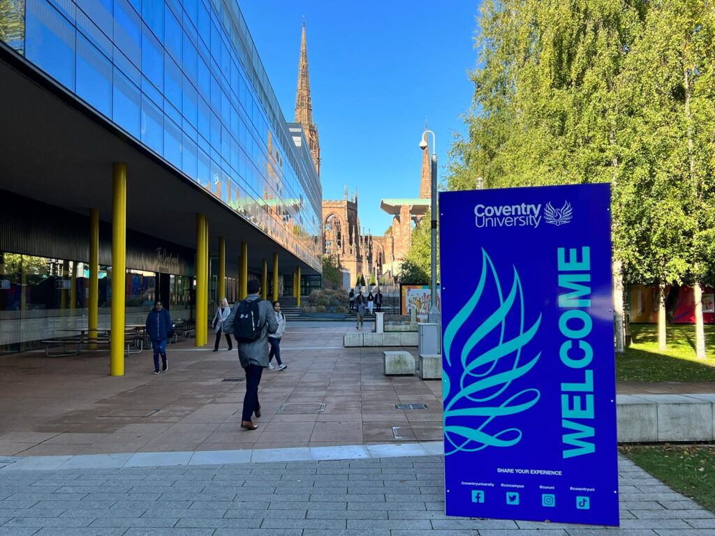 Coventry University Student Union photograph with welcome banner