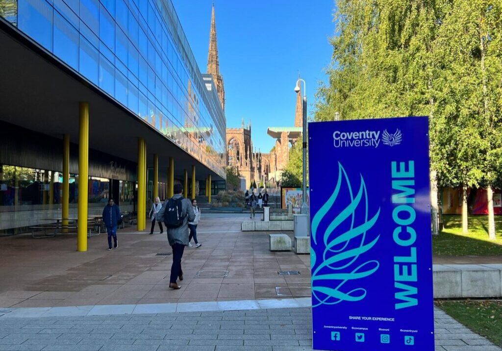 Coventry University Student Union photograph with welcome banner